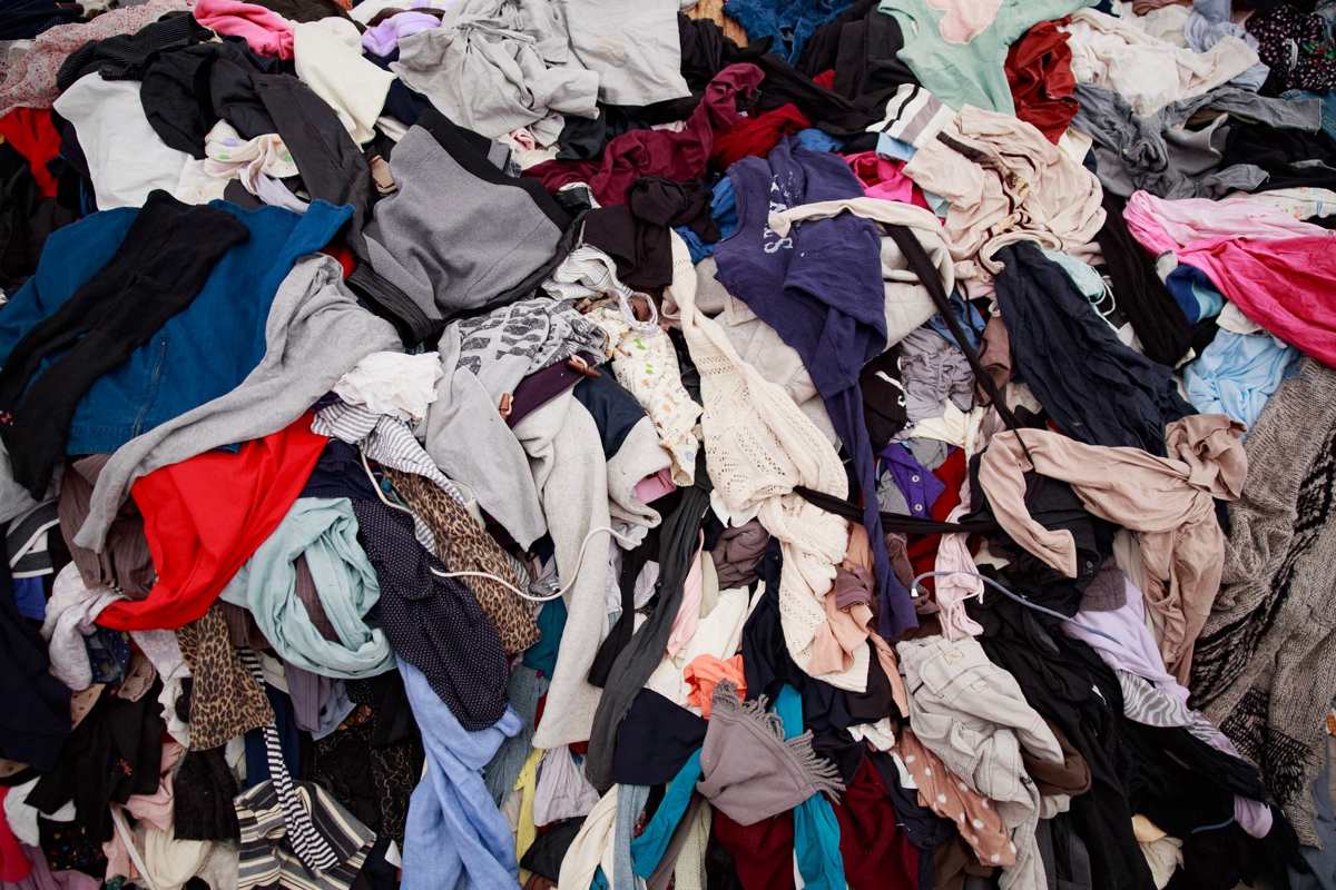 A heap of mixed clothing and soft goods