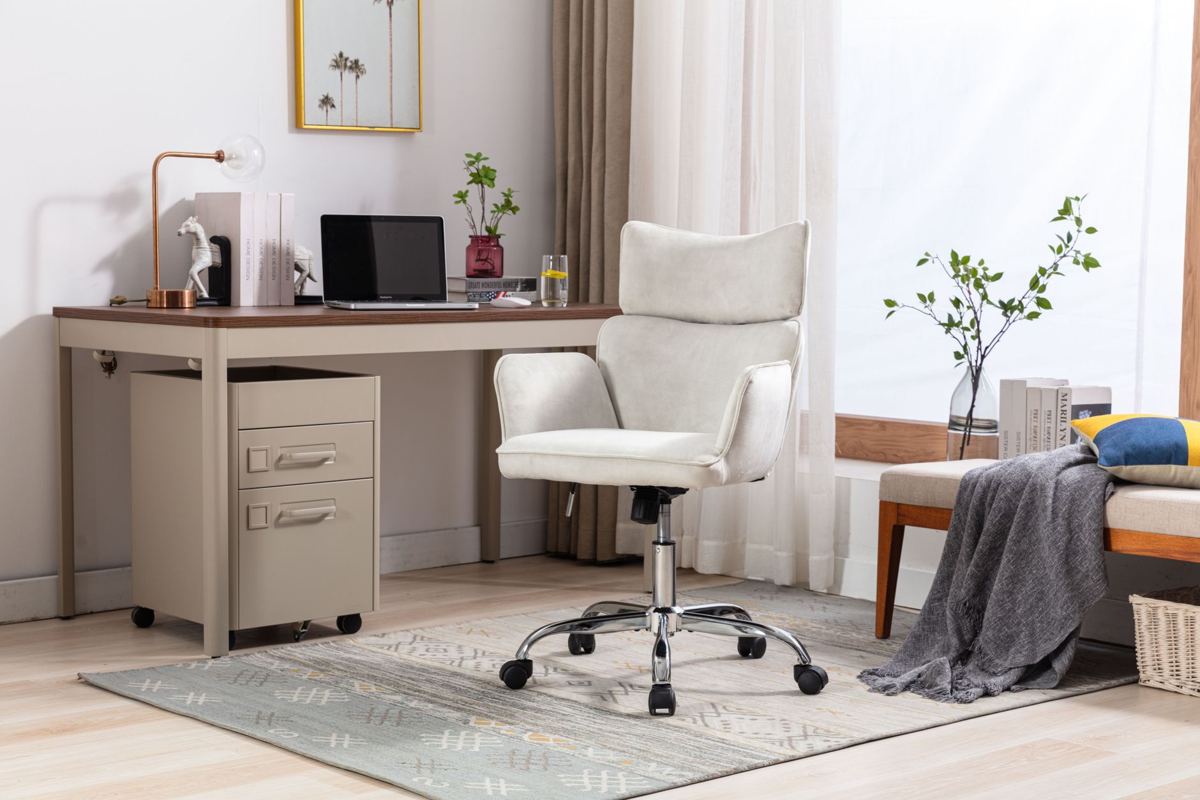 A home office with a desk, a rolling chair and a file cabinet