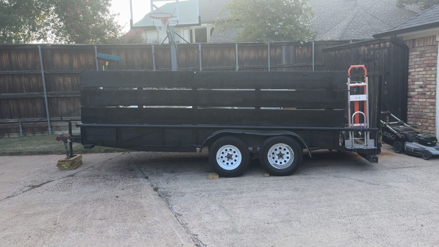 The Hero’s Junk Removal dump trailer, ready for a job in North Texas
